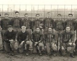 1934 Jamestown High School Football team: Kneeling: Jack Matson, Sam Hammerstrom, Phil Mula, Shushy Raffa, Morrie Patterson, Frank Scarpino. Standing: Arthur Beal (manager), Allen Ayers (assistant coach), John Fish, Ted Barry, Joe
DePrima, Bob Shearman, Gordon Jones, Chuck Lamb, Torsten Norberg, Denton Moon (coach), Tony Foti
(equipment manager). 1934 JHS football team