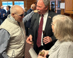 Russ Bonfiglio, left, chats with inductee Mark Edstrom and his wife, Elaine. Russ Bonfiglio, left, chats with inductee Mark Edstrom and his wife, Elaine.
