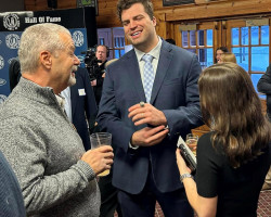 Stephen Carlson with his wife, Allie, and his uncle, Jeff DePetro. Stephen Carlson with his wife, Allie, and his uncle, Jeff DePetro.