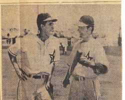 O'Neil and teammate George Genovese talk it over while waiting turns in batting drill before one of the Hollywood Stars' games. 1949. O'Neil and teammate George Genovese talk it over.