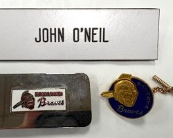 Mementos from John O'Neil's time as an Atlanta Braves scout. Mementos from John O'Neil's time as an Atlanta Braves scout.