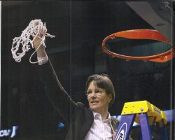 Page from the 2011 enshrinement program of the Naismith Memorial Basketball Hall of Fame . (6) Page from the 2011 enshrinement program of the Naismith Memorial Basketball Hall of Fame . (6)