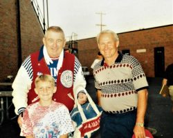 Eddie Feigner, pitcher for the King and his Court, with Stan Marshaus and son, Luke. Eddie Feigner, pitcher for the King and his Court, with Stan Marshaus and son, Luke.
