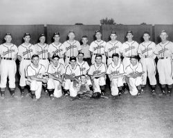 1948 Steel Partition Bombers. Standing: Merlin Peterson, Steve Dankowicz, Clay Sorenson, Marsh Studd, Frank Smerkar, Ralph Millard, Lefty Pratt, Les James, Bob Brown, Ralph Mee. Kneeling: Warren Mee, Bob Fredo, Rog DuBois, Joe Nagle, Bob Bender, Don Nagle, Joe Bender, Billy Brown. 1948 Steel Partition Bombers