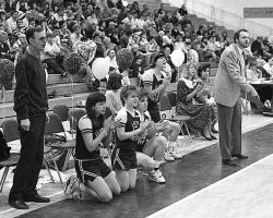 Pine Valley assistant girls basketball coach Jerry Skurcenski, standing left, and Pine Valley head coach Tim Nobles, standing far right, lead the Lady Panthers in the 1991 Far West Regional game at SUNY Geneseo. P-J file photo by Scott Kindberg. <em>Post-Journal</em> (Jamestown), April 1, 2020. 1991