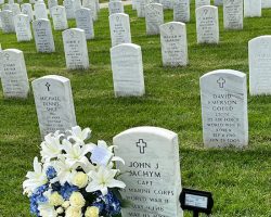 Photo taken by Jim Jachym at Arlington National Cemetery of his mother's (Arlene) ashes being laid to rest with her husband John. Photo taken by Jim Jachym at Arlington National Cemetery of his mother's (Arlene) ashes being laid to rest with her husband John.