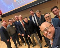 Dan Hoard, fourth from left, was among a group of Syracuse University graduates and broadcasting elites who attended this year’s Marty Glickman Award ceremony. Dan, who is the radio voice of the Cincinnati Bengals and the University of Cincinnati basketball and football teams, is joined, from the left, by Newhouse School dean Mark Lodato; Detroit Tigers play-by-play voice Jason Benetti; Olivia Stomski, the director of the Newhouse Sports Media Center; Sean McDonough of ESPN; Bob Costas, formerly of NBC and now MLB Network; Glickman Award winner Matt Park, the current voice of the Orange and a Newhouse professor; “Voice of Basketball” Marv Albert; Drew Carter, the TV voice of the Boston Celtics; Ian Eagle of CBS; and Mike Tirico of NBC. Dan Hoard, fourth from left, was among a group of Syracuse University graduates and broadcasting elites who attended this year’s Marty Glickman Award ceremony.