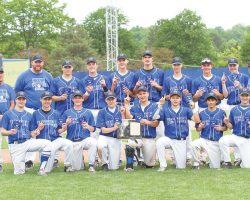 The Westfield Wolverines pose for a photo with their Section VI Class D championship plaque and blue patches after defeating North Collins, 5-0, at Diethrick Park in Jamestown. May 2015. The Westfield Wolverines pose for a photo. May 2015