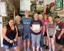 Chris with her family and friends on a visit to the CSHOF June 10, 2021. Chris with her family and friends.