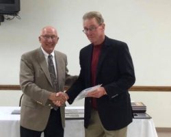 Tom Priester with Jeff Buchholz, president North East High School Athletic Hall of Fame. Tom Priester with Jeff Buchholz, president North East High School Athletic Hall of Fame.