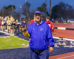 Tom Priester shows the pin he received from the SWNY Track & Field Officials commemorating his 50th year as an active official. May 2025. Tom Priester shows the pin he received from the SWNY Track & Field Officials commemorating his 50th year as an active official. May 2025.