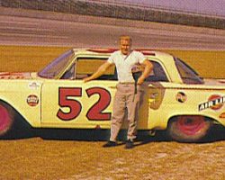Cale Yarborough standing beside Julian Buesink's 1961 Ford at Daytona
in 1962. Cale Yarborough standing beside Julian Buesink's 1961 Ford at Daytona in 1962.