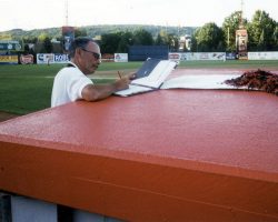 Jim Riggs filling out his scorecard at Diethrick Park. fillingscorecard