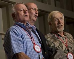 From left, Carl Schwartz, Bob Staley and Phil Gravink, three members
of the Cornell crew that won the 1957 Henley Royal Regatta, sing
"The Rowing Song" during the Savage Club's annual variety show. Courtesy Cornell University "The Rowing Song" during the Savage Club's annual variety show. Courtesy Cornell University