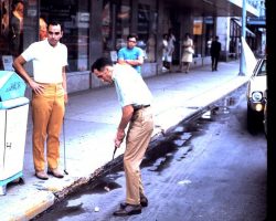 This 1971 photo shows Pete Hubbell and Jim Roselle engaged in a "goofy golf" putting
contest that started at the old WJTN studios on West Third Street in Jamestown and
ended at Maplehurst Country Club in the Town of Busti several miles away. The
promotion was sponsored by Collins Sports Shop and was the idea of Dana Lindstrom,
a Collins' employee. Pete Hubbell and Jim Roselle.