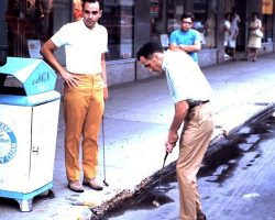 This 1971 photo shows Pete Hubbell and Jim Roselle engaged in a "goofy golf" putting contest that started at the old WJTN studios on West Third Street in Jamestown and ended at Maplehurst Country Club in the Town of Busti several miles away. The promotion was sponored by Collins Sports Shop and was the idea of Dana Lindstrom, a Collins' employee. Pete Hubbell and Jim Roselle engaged in a "goofy golf" putting contest.