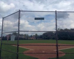 Softball field at Jones Memorial Park is signed "Olsen Field." Olsen Field