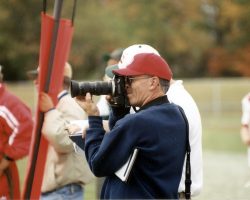 Jim Riggs shooting photos at a JHS football game. shootingJHSfootball