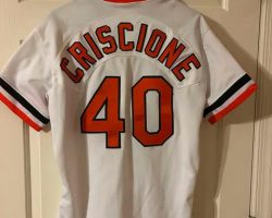 Jerry Bass in Maryland contacted the CSHOF. He had purchased Dave Criscione's uniform at a Baltimore Orioles uniform sale more than 40 years ago. He offered to donate it to the hall. CSHOF Randy Anderson contacted Dave and found out that he did not have his Baltimore uniform. Mr. Bass agreed to give the uniform to Dave who in turn will give it to his children. Dave Criscione's uniform.