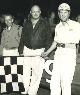Left to right, mechanic Jim Fardink, owner Julian Buesink, and driver Freddy Knapp after a win at Stateline on July 30, 1966.