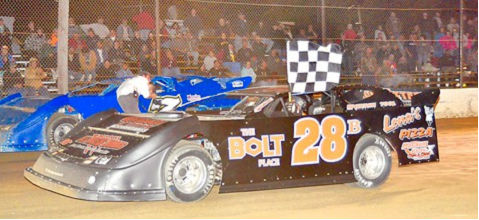 Dick Barton waves the flag.
