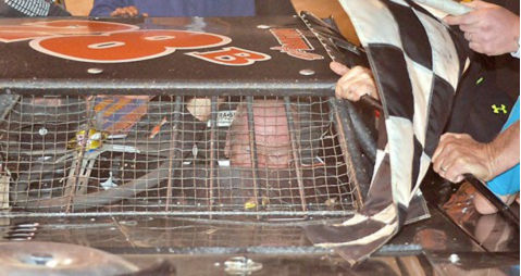 Barton prepares to leave his retro car.