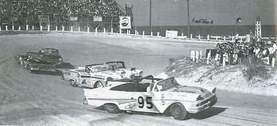 Fireball Roberts at the NASCAR Convertible race at Daytona road/beach course, 1958.