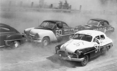 Jim Paschal driving Buesink's 1950 Ford #60 at a race in Macon, Georgia where he finished third.