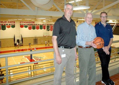 Jim McElrath Sr., center, is flanked by his sons, Mike, left, and Jim Jr.