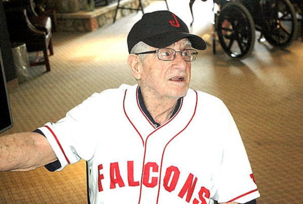 John O’Neil displays a throwback uniform top and cap.