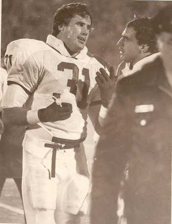 Shane Conlan, left, talks with teammate Michael Zordich.