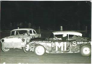 Jug Pierce and Bob Schnars collide on track.