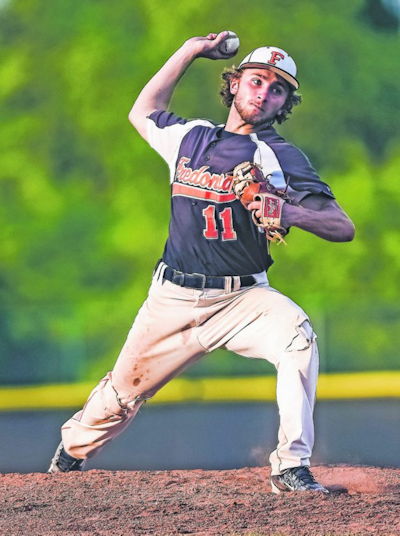 Jarod Burmaster pitching.