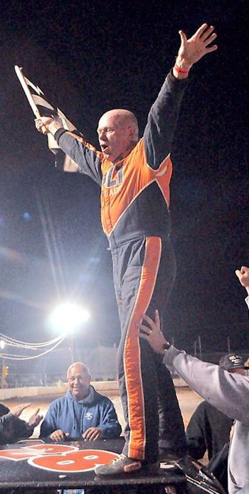 Dick Barton celebrates his record-setting 80th career victory.
