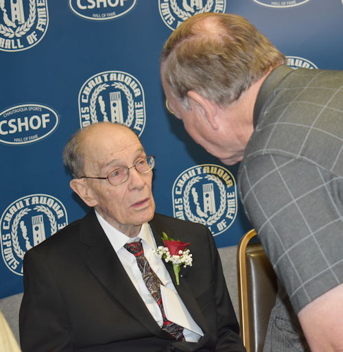 Dave Kolstee, right, speaks to longtime Southern Tier official Elly Norton.