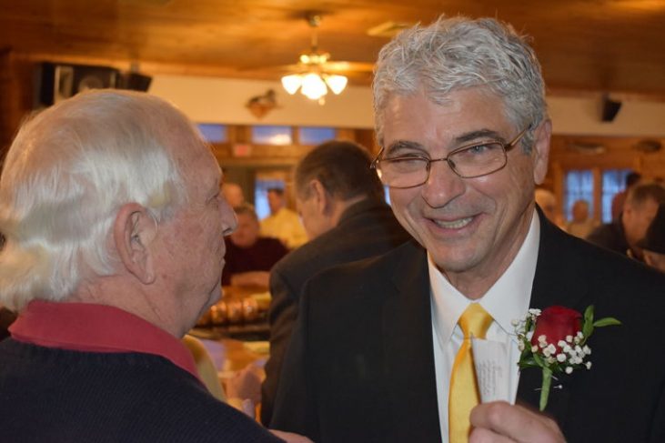 Bob Wisniewski, left, speaks to 2020 inductee Mark Orlando