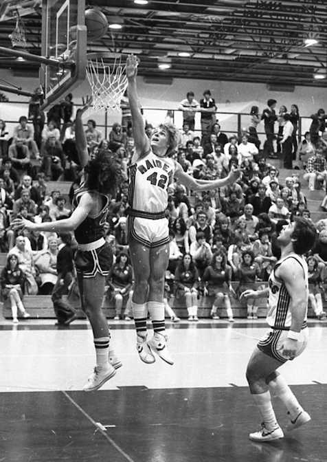 Mark Prechtl (42) attempts to block a shot.