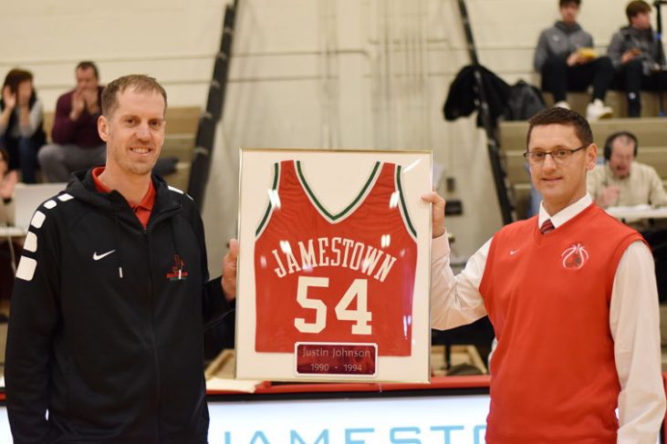 Justin Johnson's jersey is retired by Ben Drake.