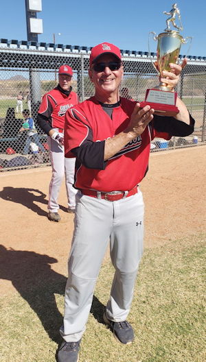 Charlie LaDuca poses with the championship trophy.