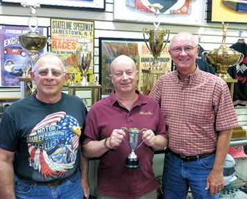 Jim Kianos, left, and Johnny Okerlund with Randy Anderson.