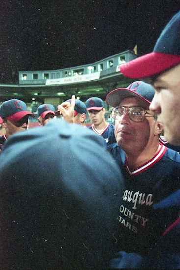 Frank Corsoro watches the action from the dugout.