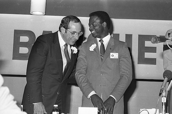 Mario Cuomo and Lou Brock.