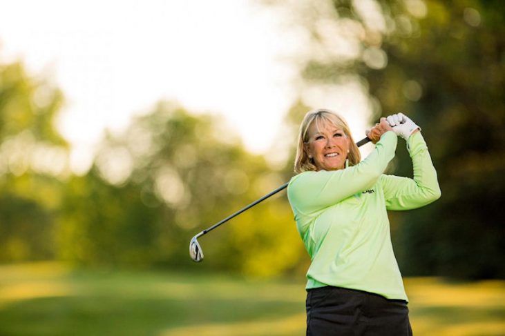Cindy Miller takes a swing.