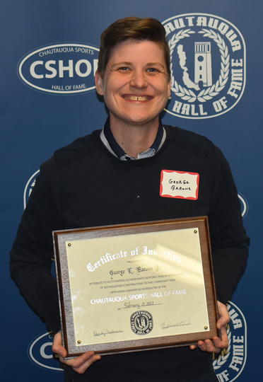 Brooke Barone with her late father's certificate.