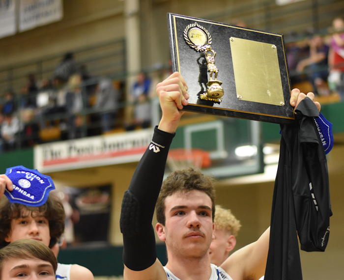 Westfield’s Wyatt Schuster shows off the trophy.