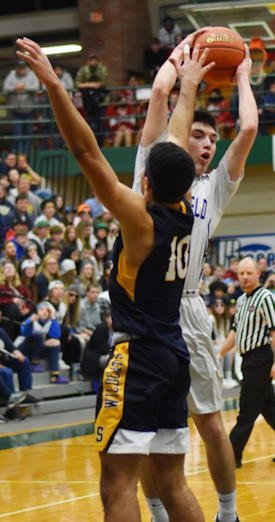 Westfield’s Darien Swanson looks for an open teammate.