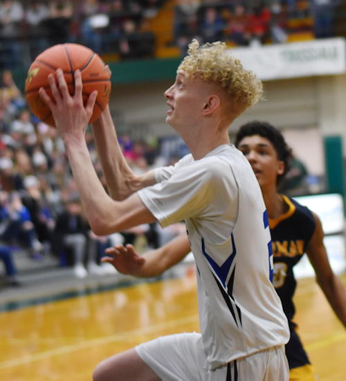 Westfield’s Ethan Weingart drives to the basket.