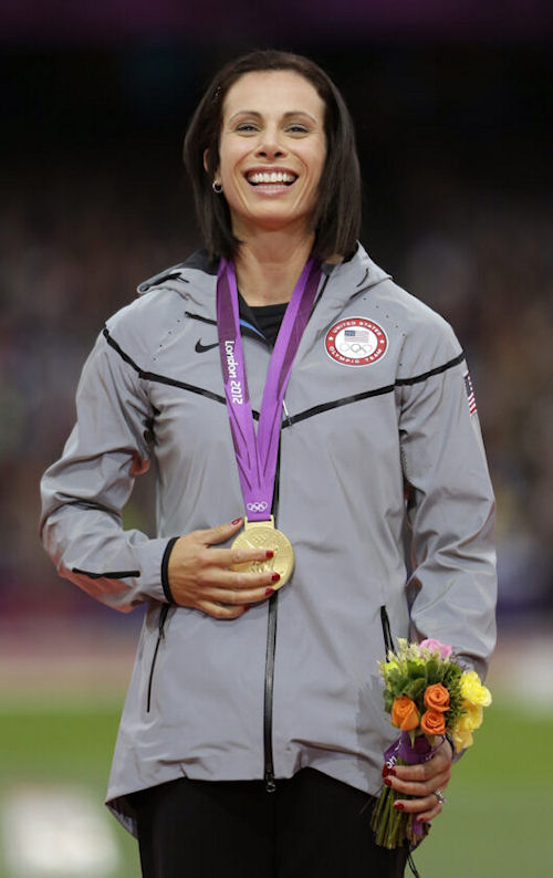 Jenn Suhr poses with her gold medal.