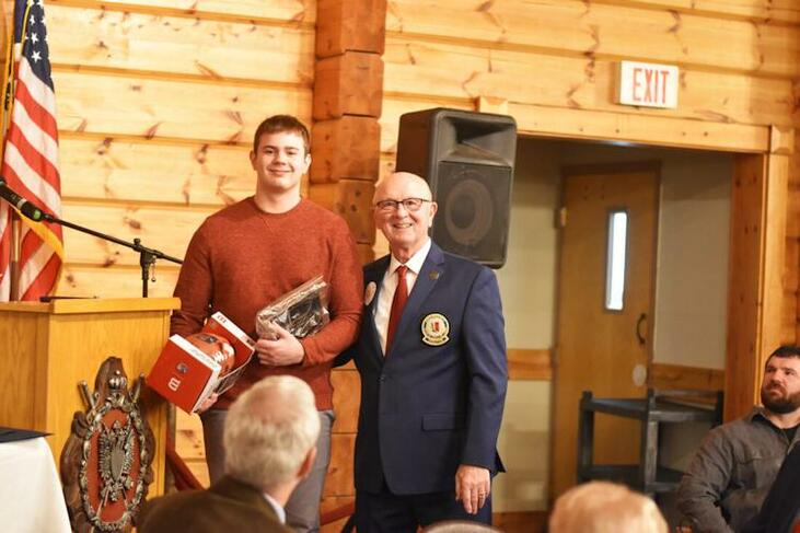 Jamestown's Sean O'Brien is honored by Randy Anderson.