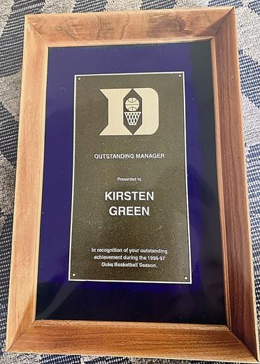 Outstanding Manager plaque.